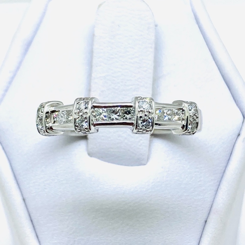 Beautiful white gold and diamond right hand band
